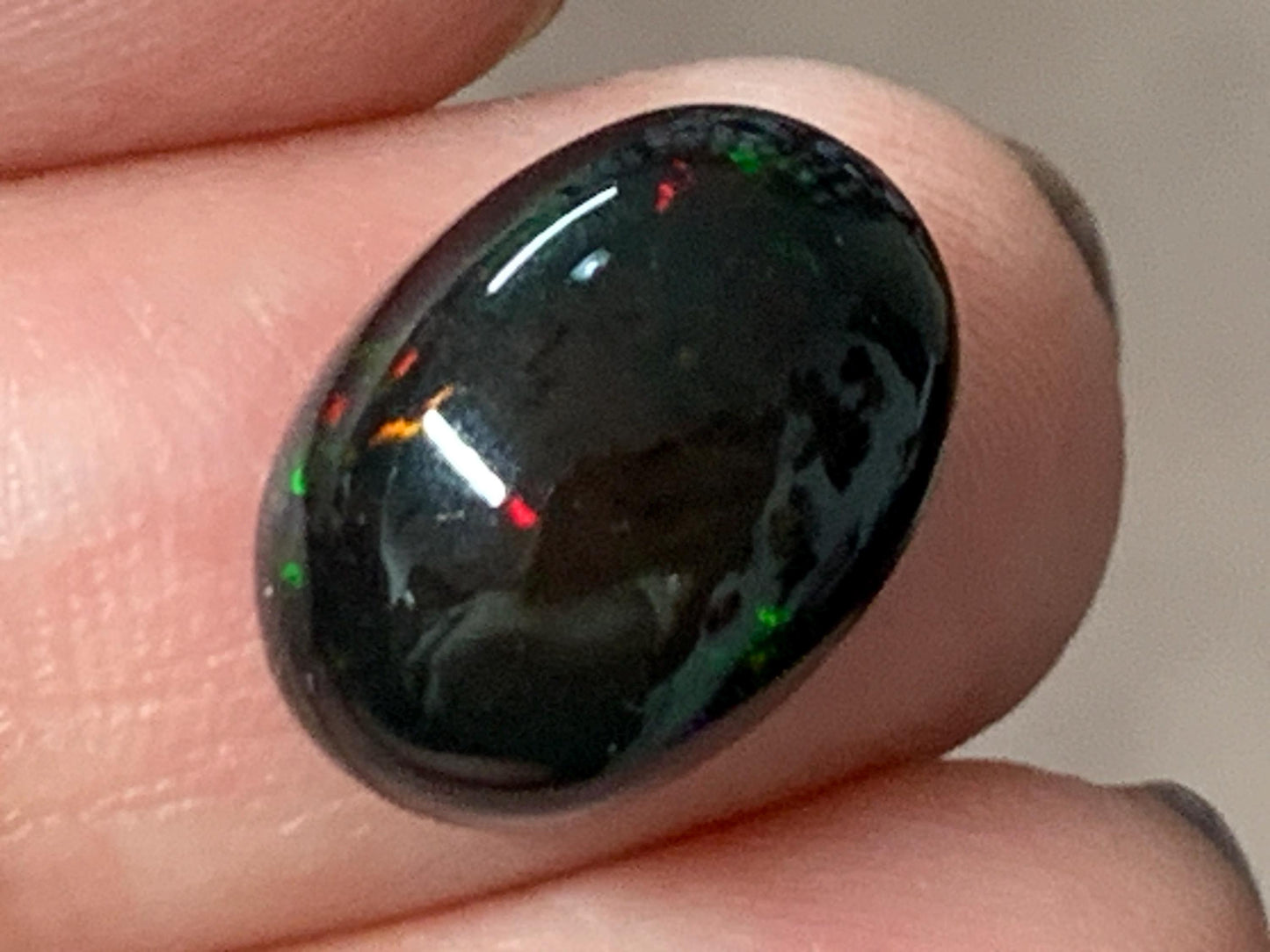 Natural Ethiopian Black Opal 10x14x6mm cabochon