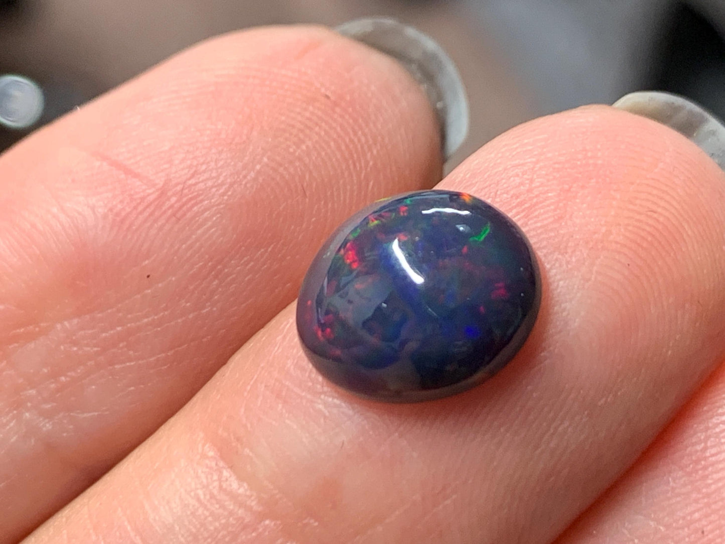 Natural Ethiopian Black Opal 8x11x4mm cabochon