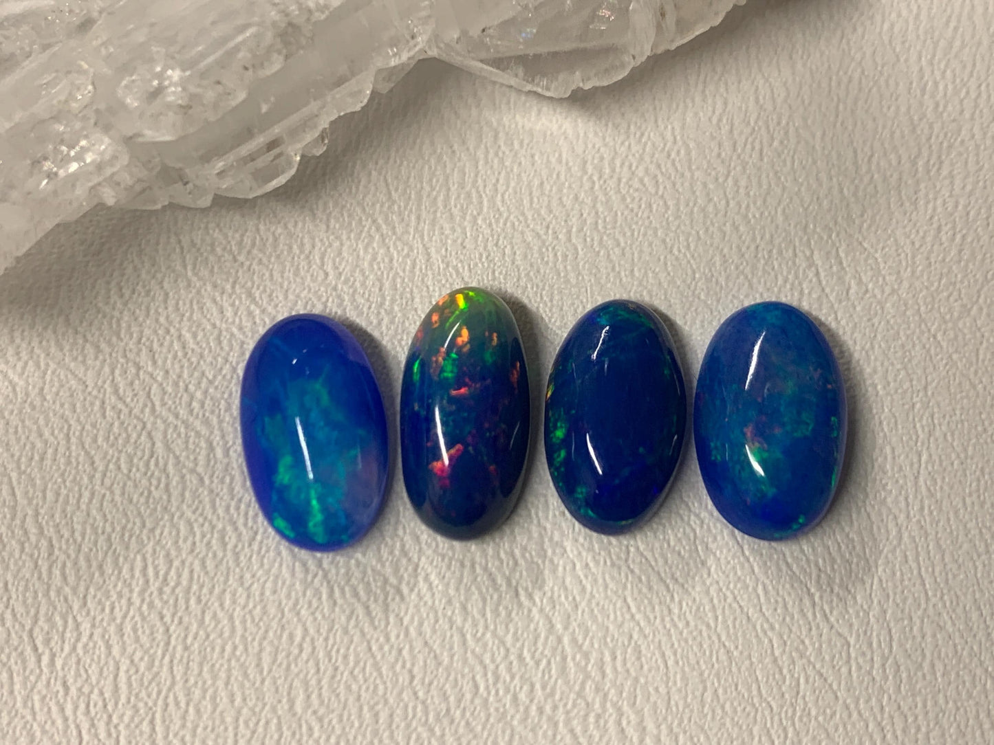 Ethiopian Opal oval 11-12mm long cabochon - Natural Opal smoked to blue color