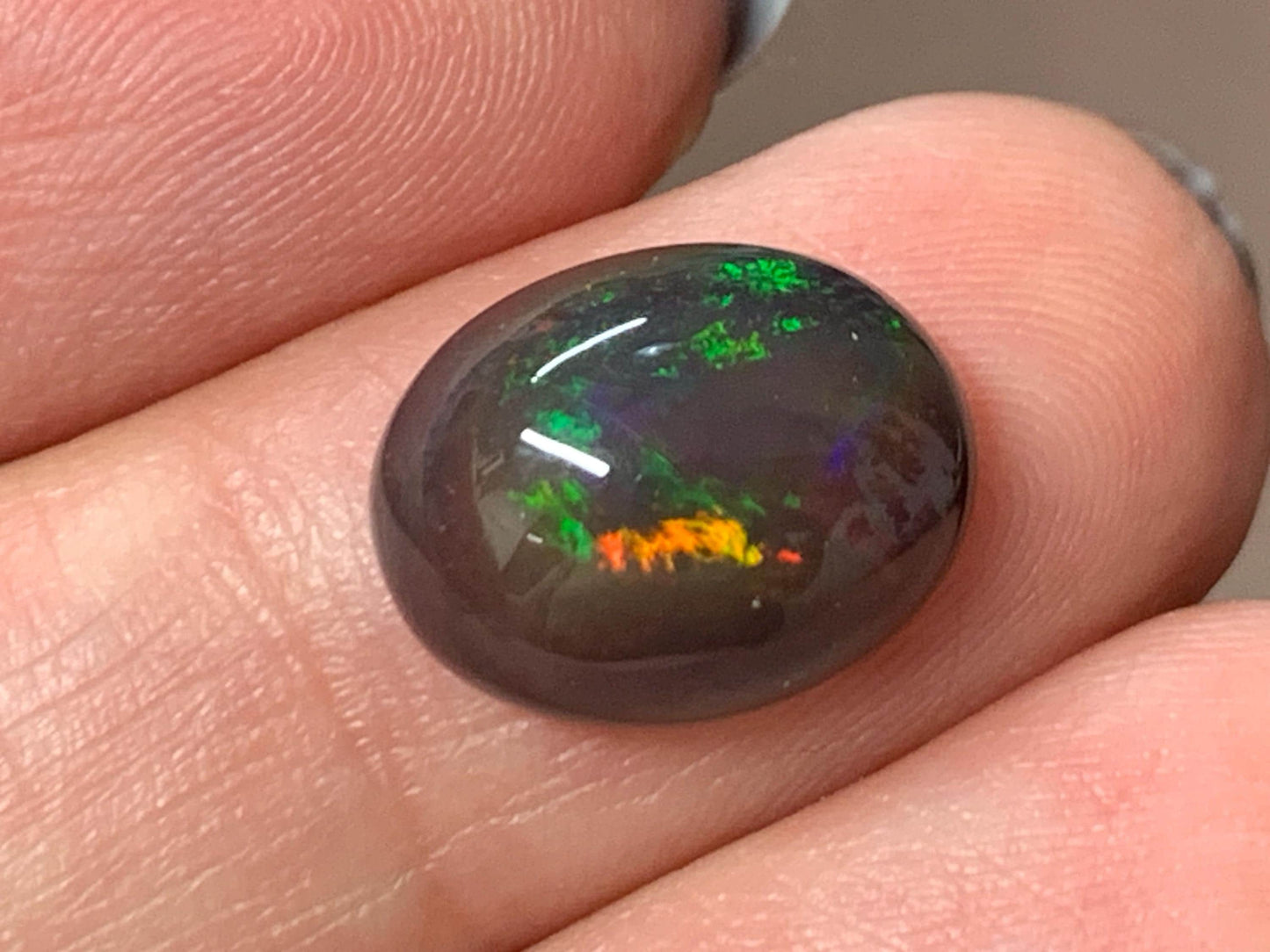 Natural Ethiopian Black Opal 10x13x5mm cabochon