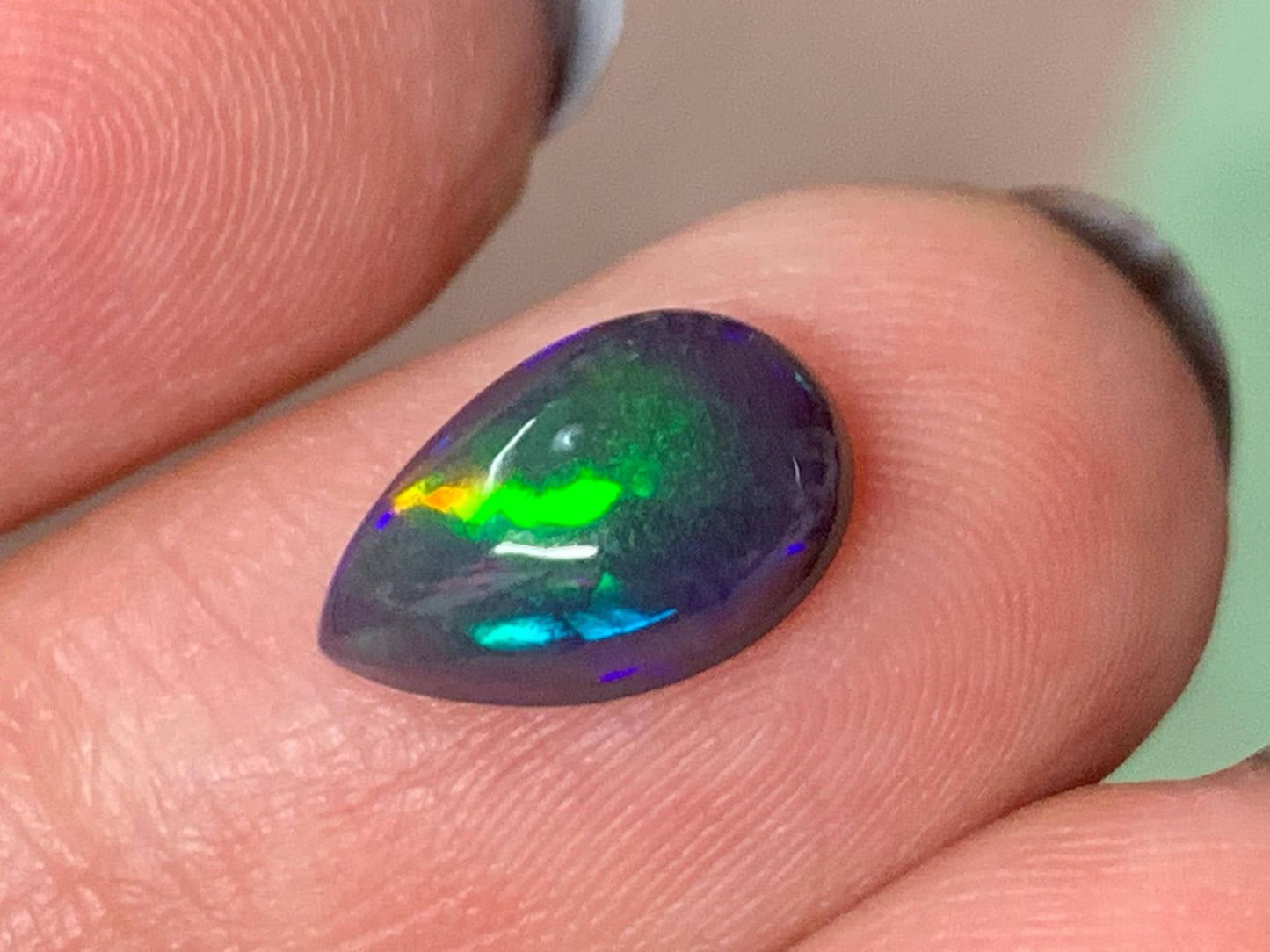 Natural Ethiopian Black Opal 7x11x4mm cabochon