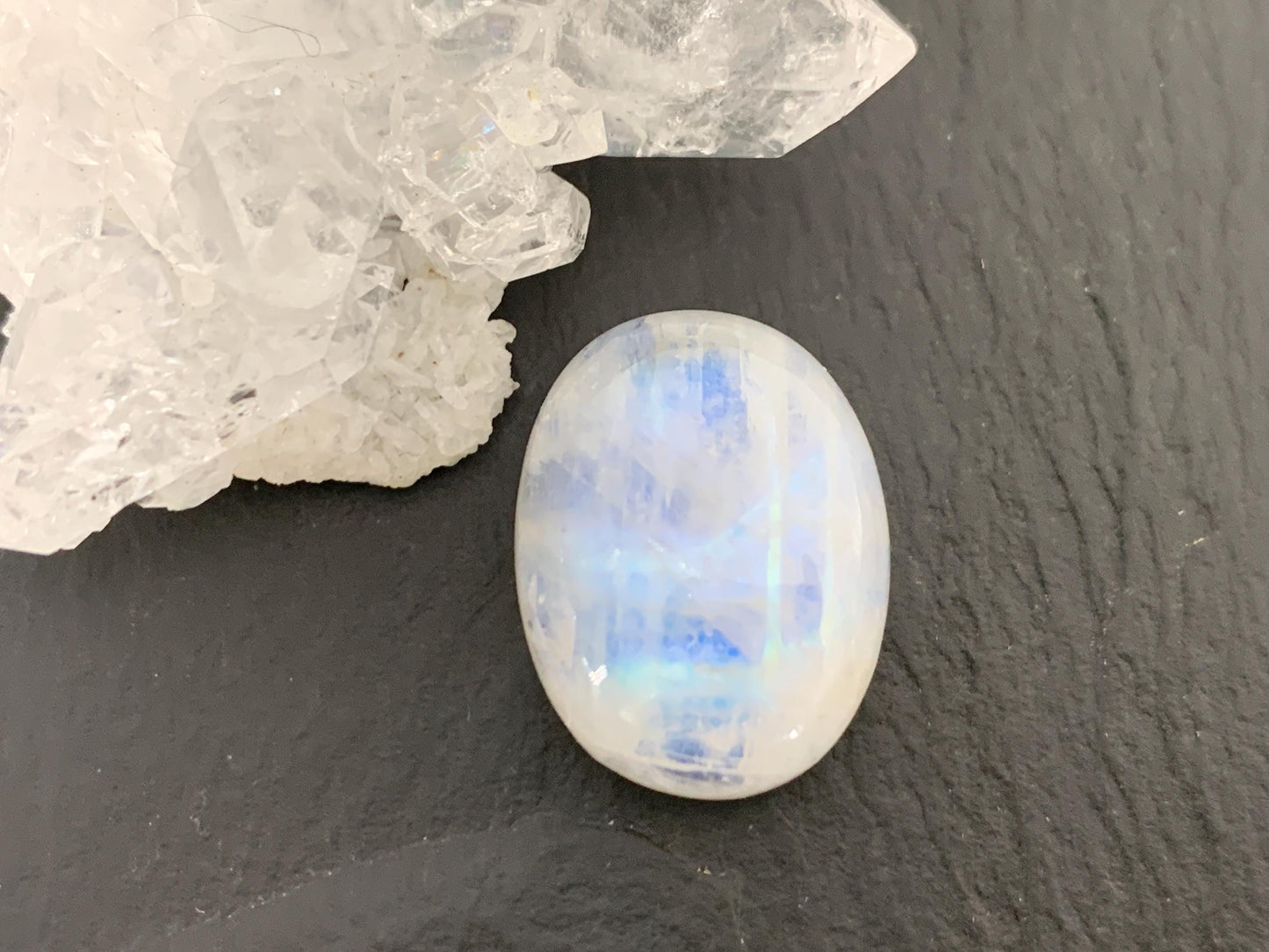 Rainbow Moonstone oval 21x16x9mm cabochon
