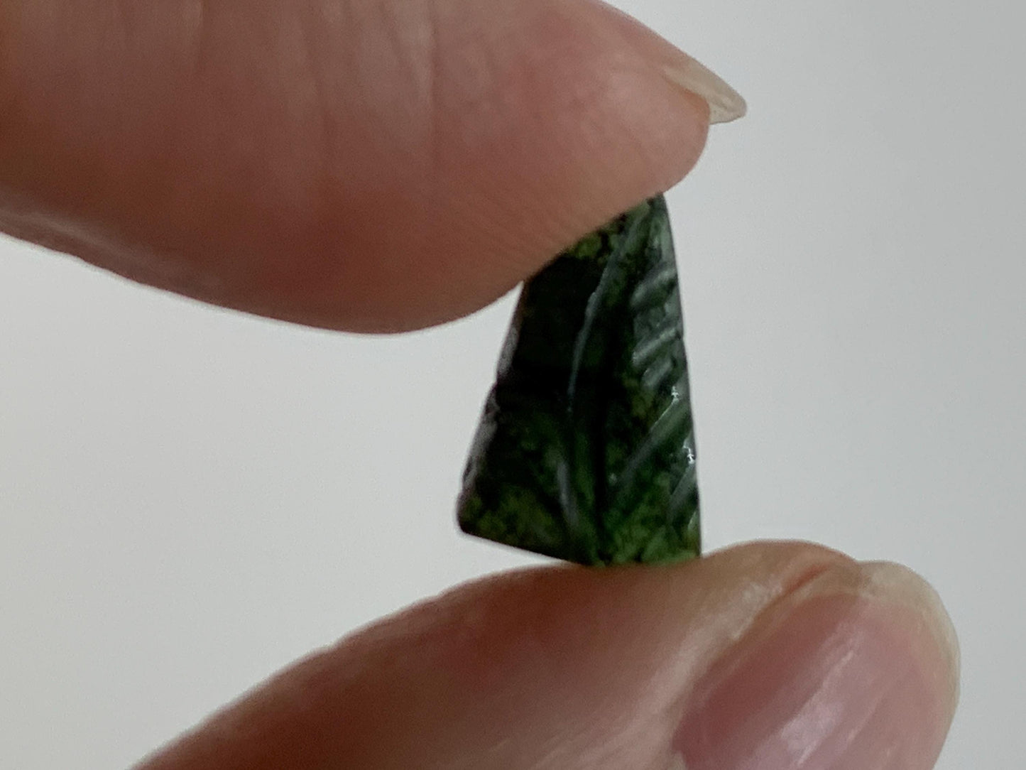Carved Tourmaline 7x11x3mm cabochon