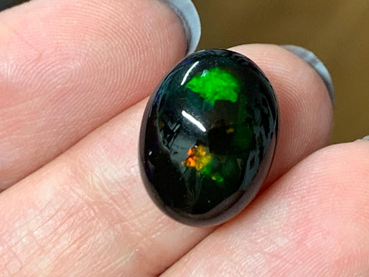 Natural Ethiopian Black Opal 12x16x6mm cabochon