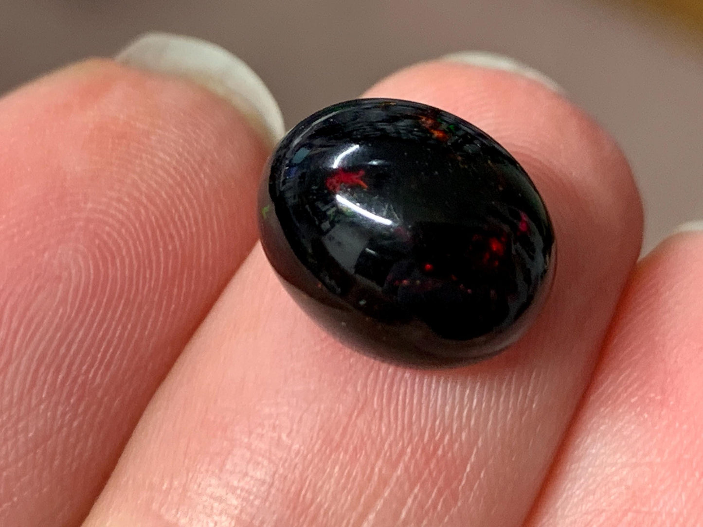 Natural Ethiopian Black Opal 9x12x7mm cabochon