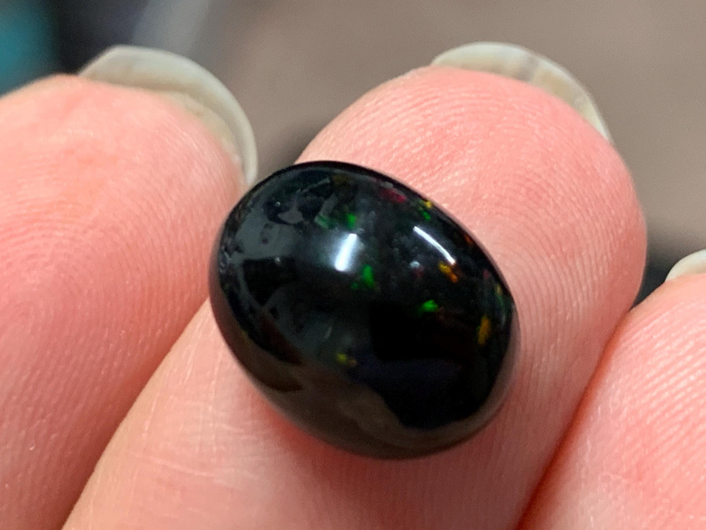Natural Ethiopian Black Opal 9x12x7mm cabochon