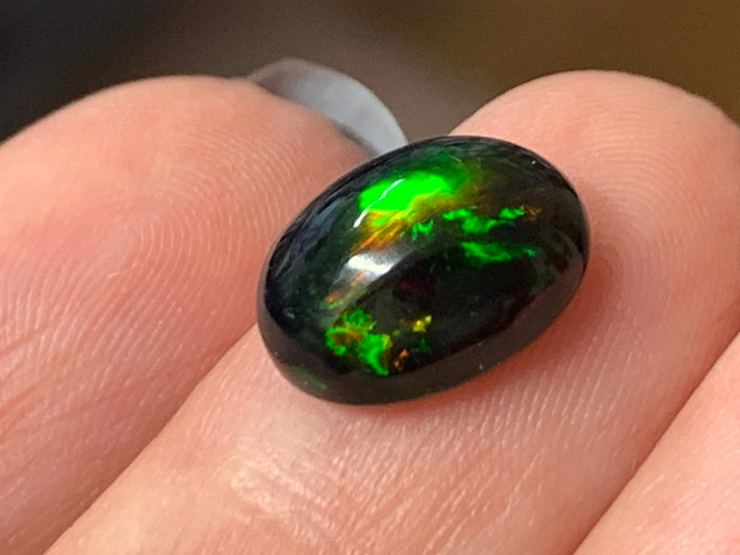 Natural Ethiopian Black Opal 9x12x5mm cabochon