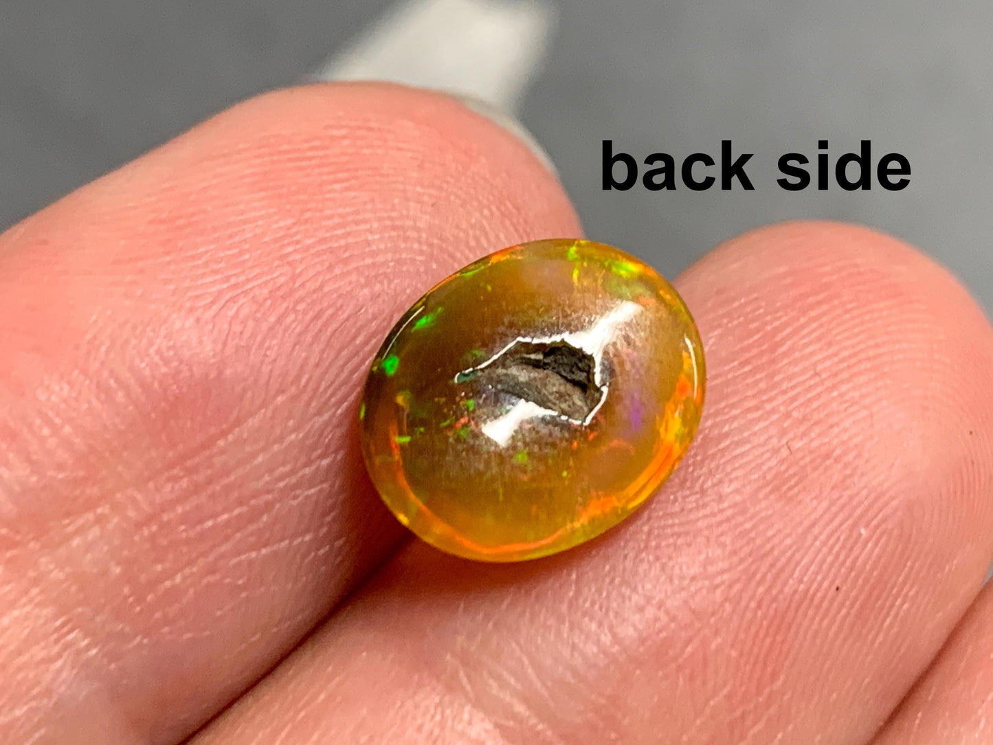 Natural Black Ethiopian Opal oval 9x11x4mm cabochon