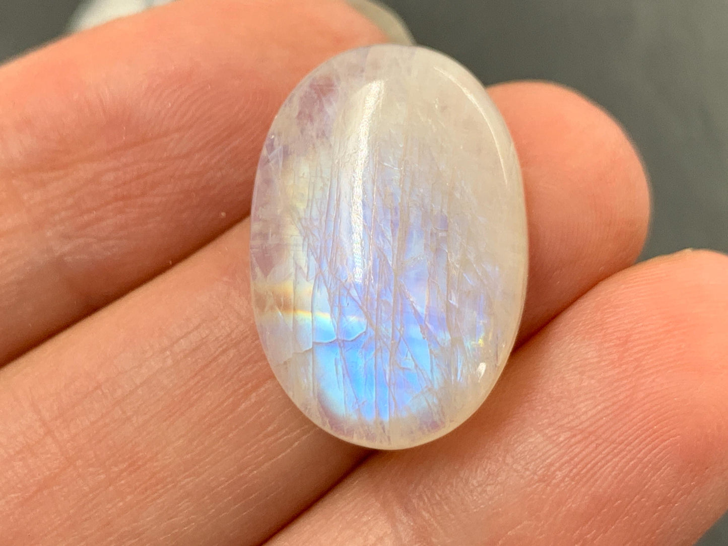 Rainbow Moonstone oval 22x15x6mm cabochon