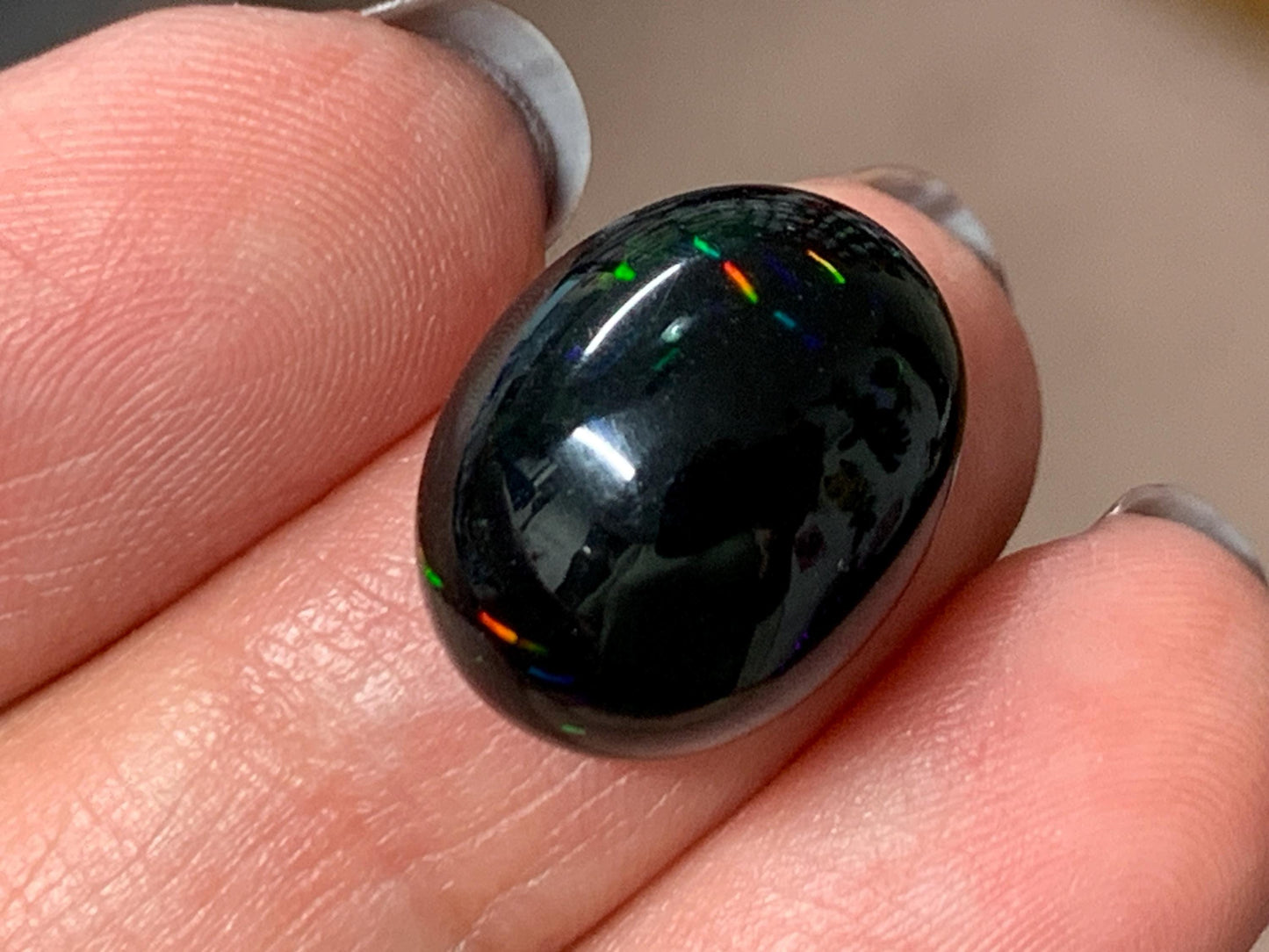 Natural Ethiopian Black Opal 13x16x5mm cabochon