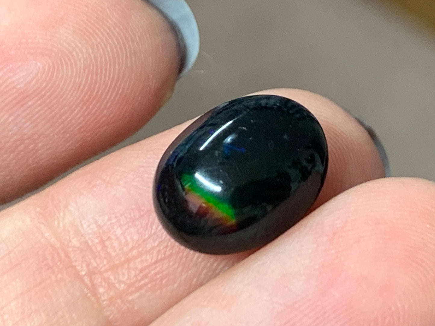 Natural Ethiopian Black Opal 10x12x5mm cabochon