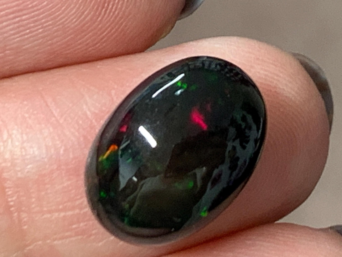 Natural Ethiopian Black Opal 10x14x6mm cabochon