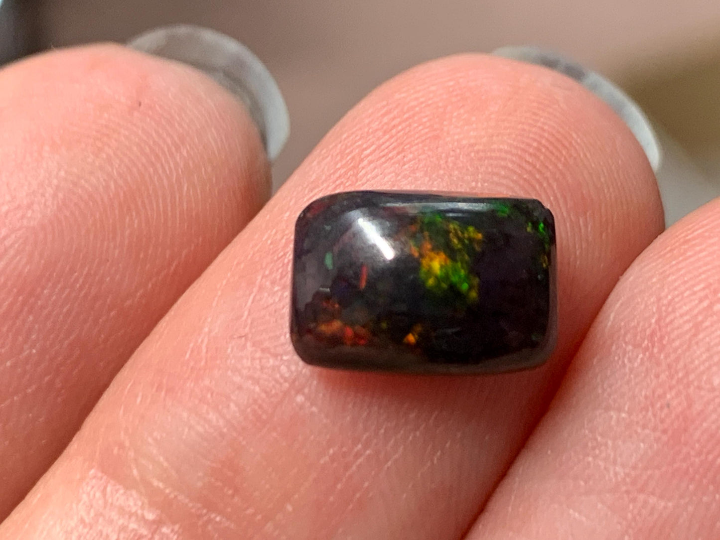 Natural Ethiopian Black Opal 6x9x3mm cabochon