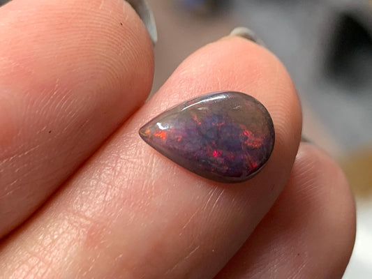 Natural Ethiopian Black Opal 7x11x3mm cabochon