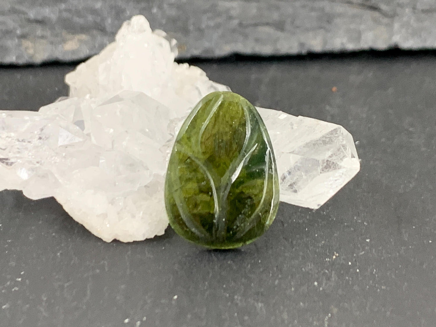 Carved Tourmaline 12x16x2mm cabochon