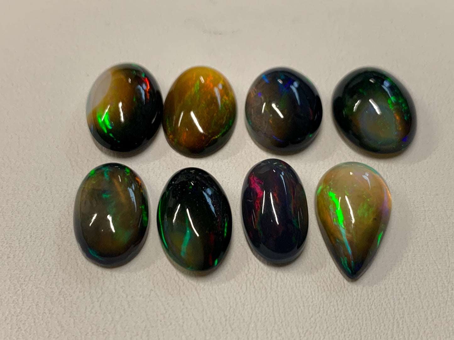 Natural Ethiopian Black Opal oval, pear 13-15mm long cabochon