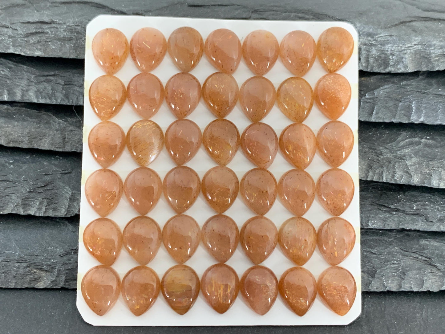 Gold Sunstone pear 8x10mm cabochon