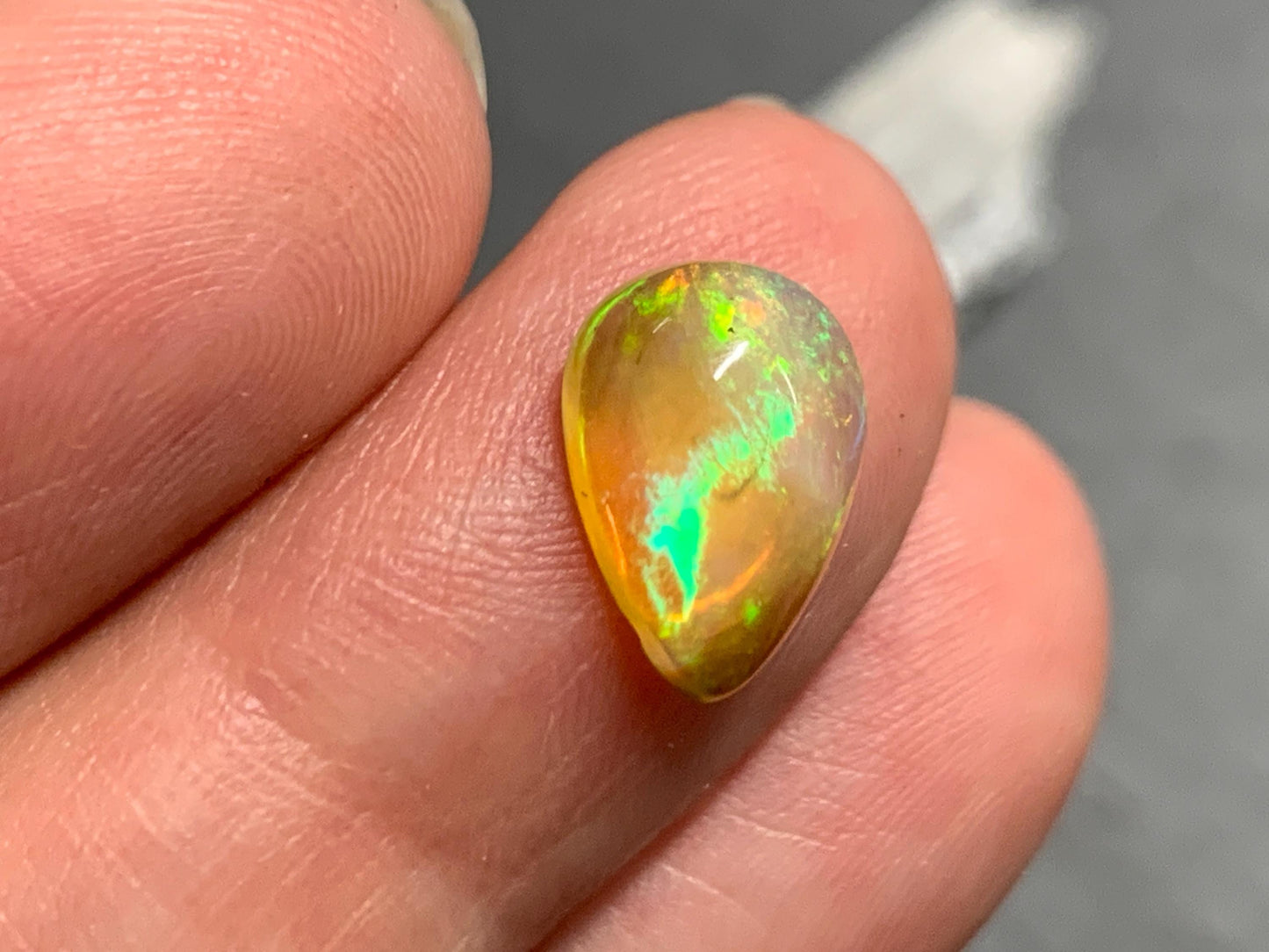 Natural Black Ethiopian Opal pear 8x11x5mm cabochon