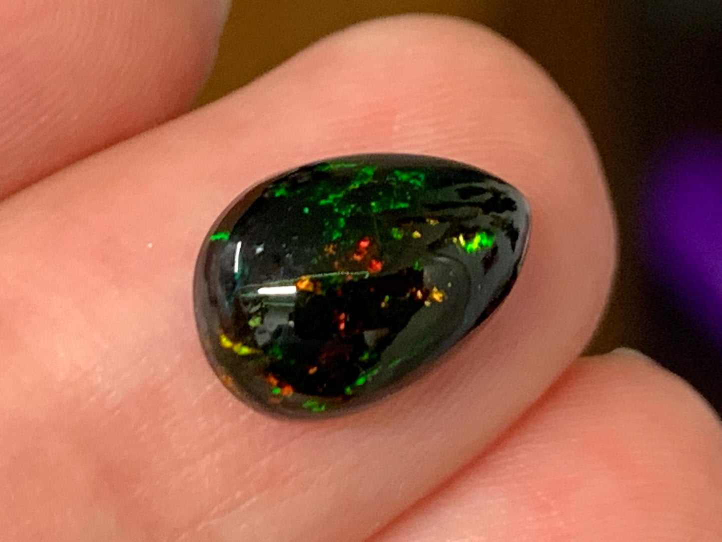 Natural Ethiopian Black Opal 8x12x4mm cabochon
