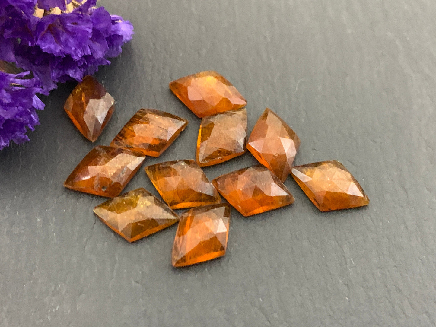 Faceted Orange Kyanite rhombus 8x12mm cabochon