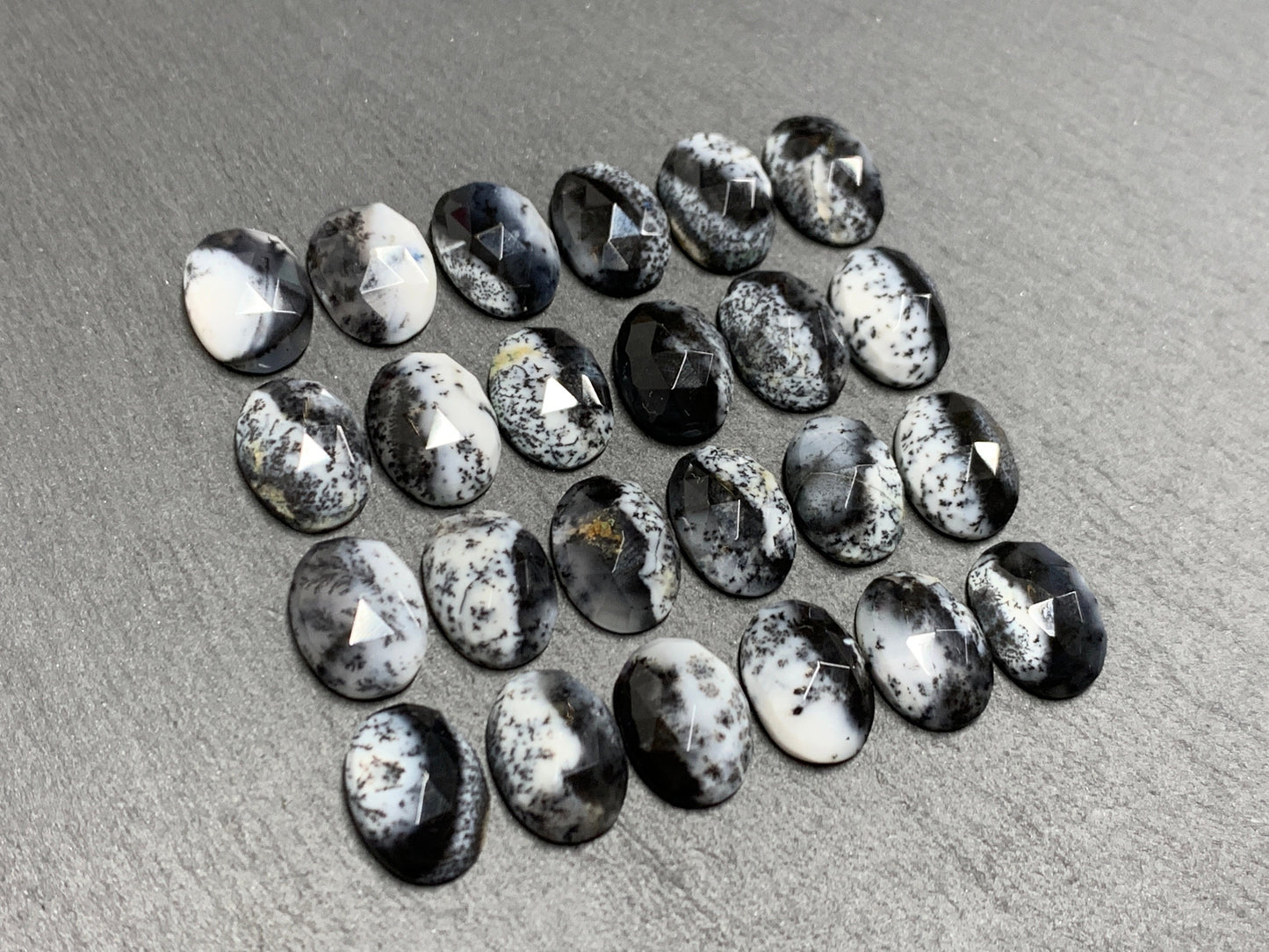 Faceted Dendrite Opal oval 10x14mm cabochon