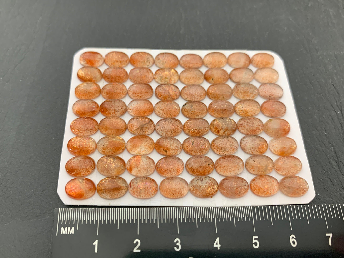 Sunstone oval 6x8mm cabochon