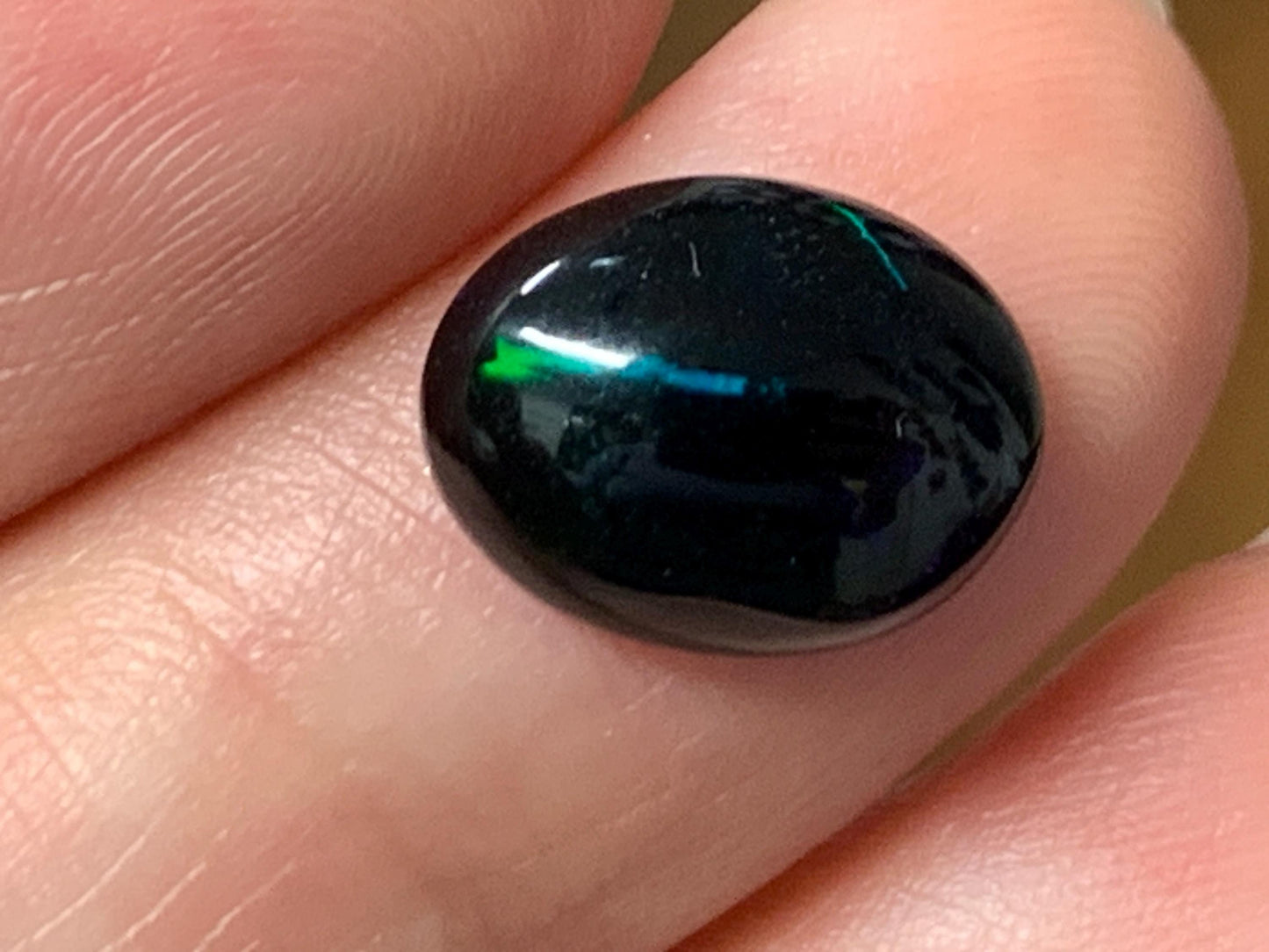 Natural Ethiopian Black Opal 9x12x5mm cabochon