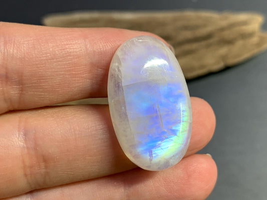 Rainbow Moonstone oval 30x18x7mm cabochon