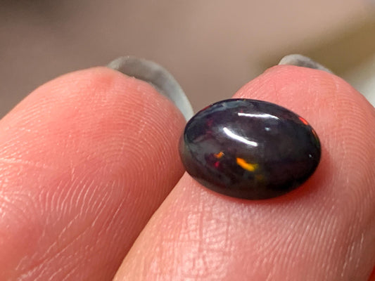 Natural Ethiopian Black Opal 7x9x3mm cabochon