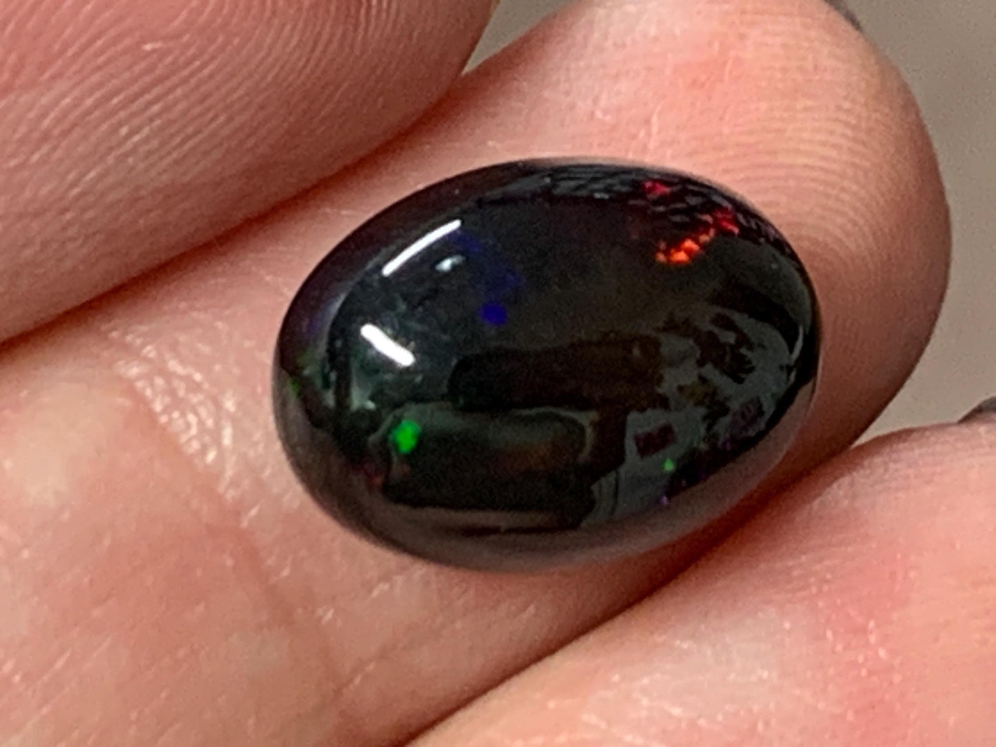 Natural Ethiopian Black Opal 10x14x6mm cabochon