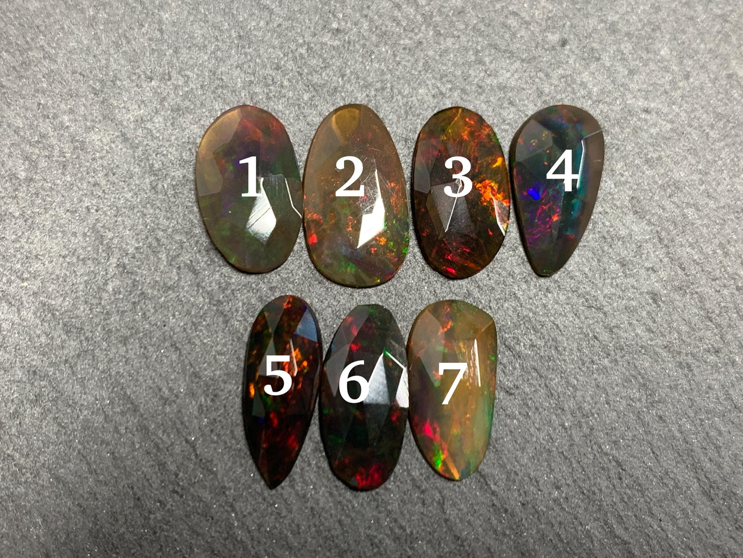 Faceted Black Ethiopian Opal 11-12mm long cabochon