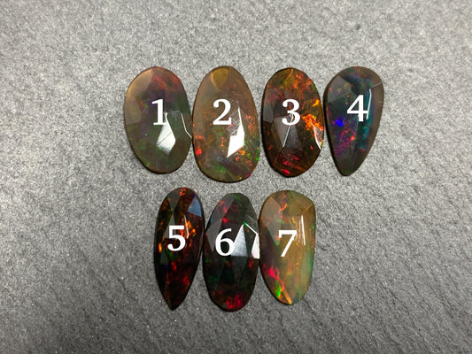 Faceted Black Ethiopian Opal 11-12mm long cabochon