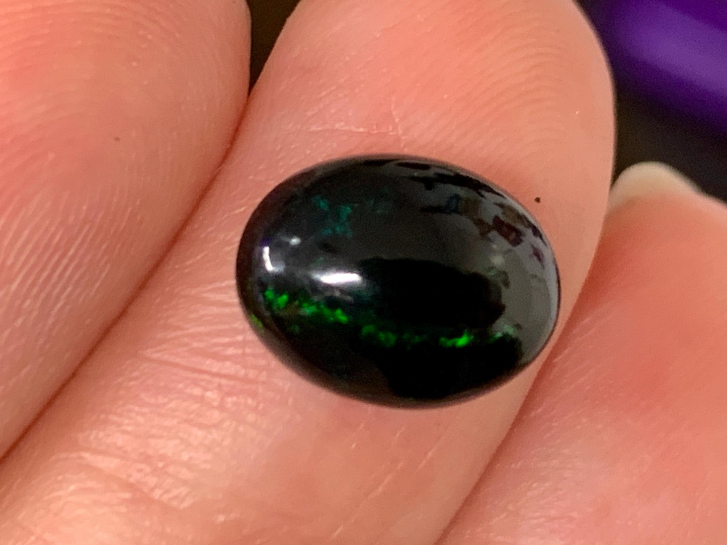 Natural Ethiopian Black Opal 8x11x4mm cabochon