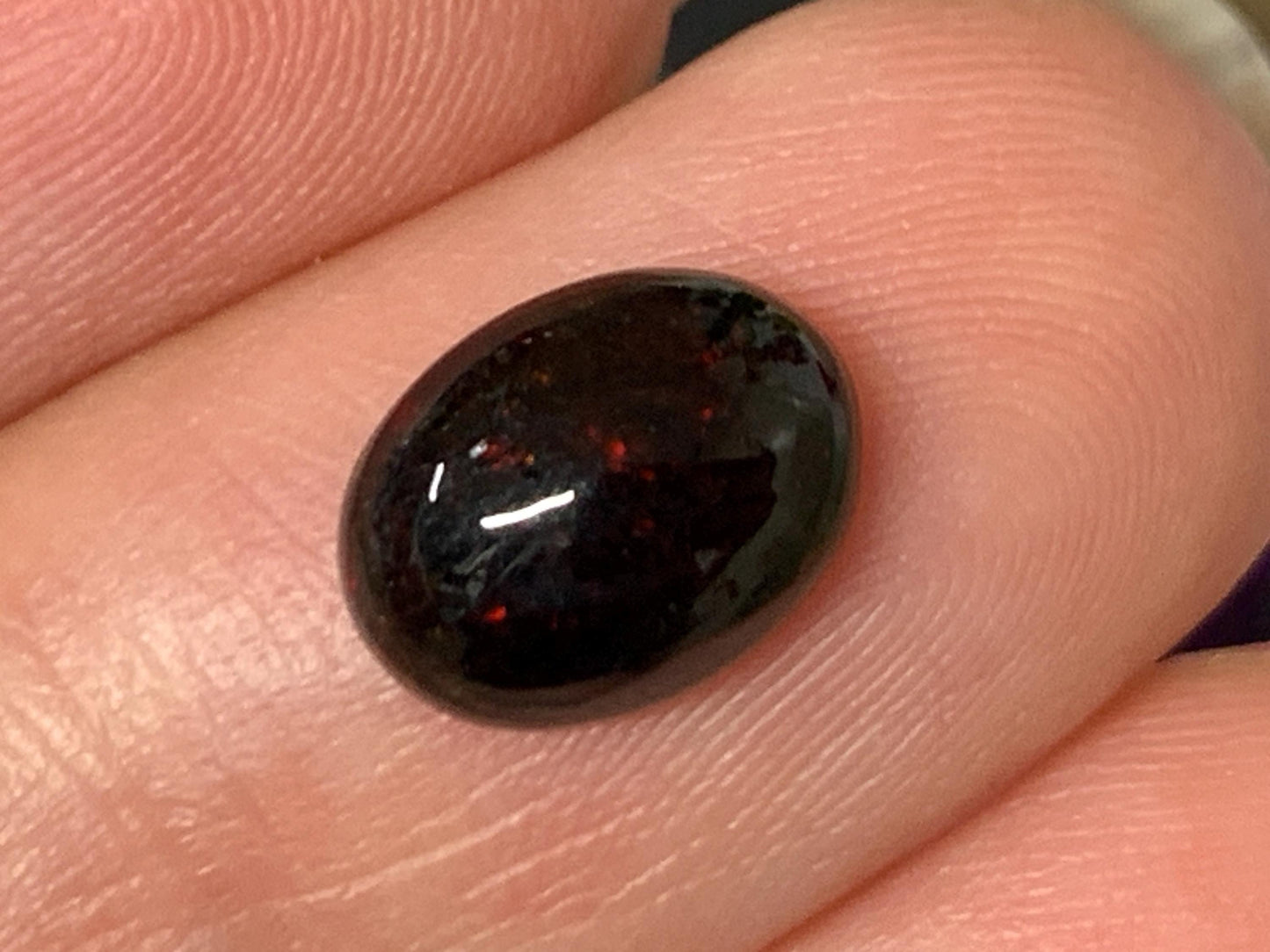 Natural Ethiopian Black Opal 7x9x4mm cabochon