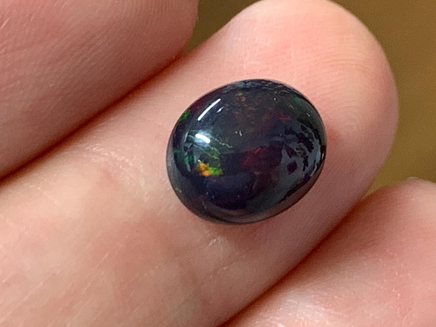 Natural Ethiopian Black Opal 8x10x5mm cabochon