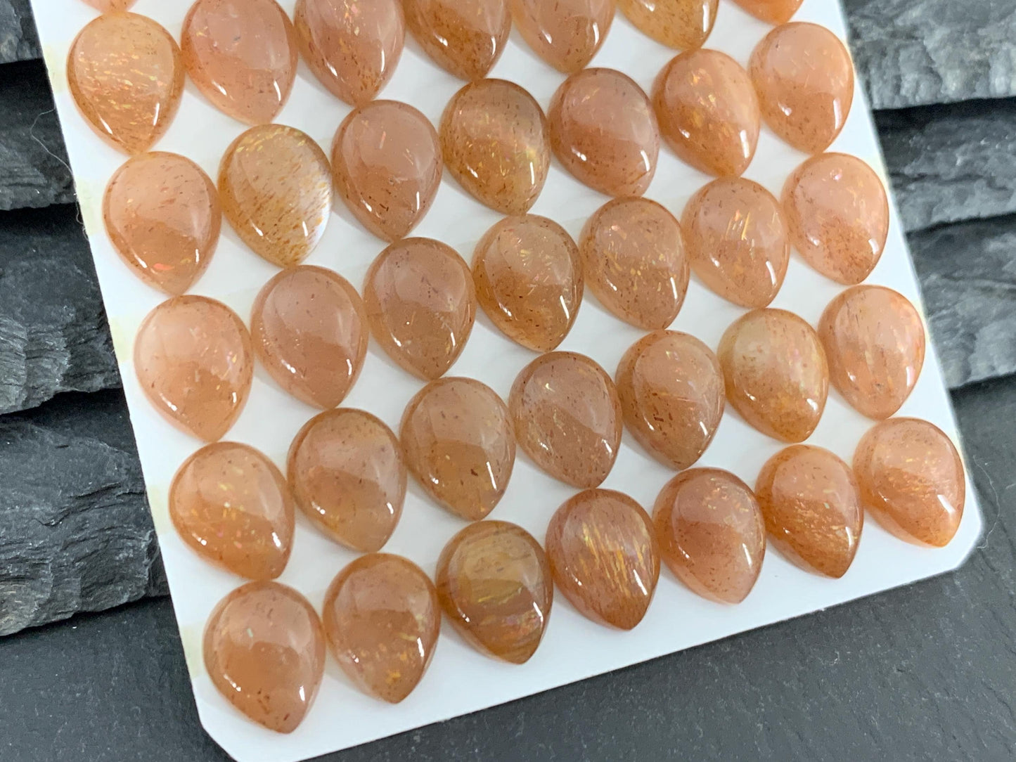 Gold Sunstone pear 8x10mm cabochon
