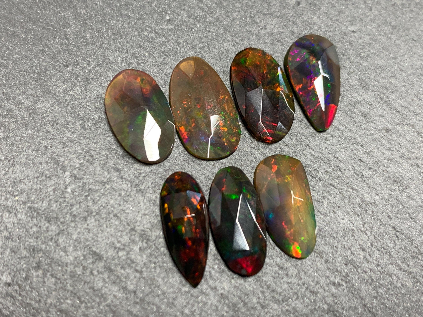Faceted Black Ethiopian Opal 11-12mm long cabochon