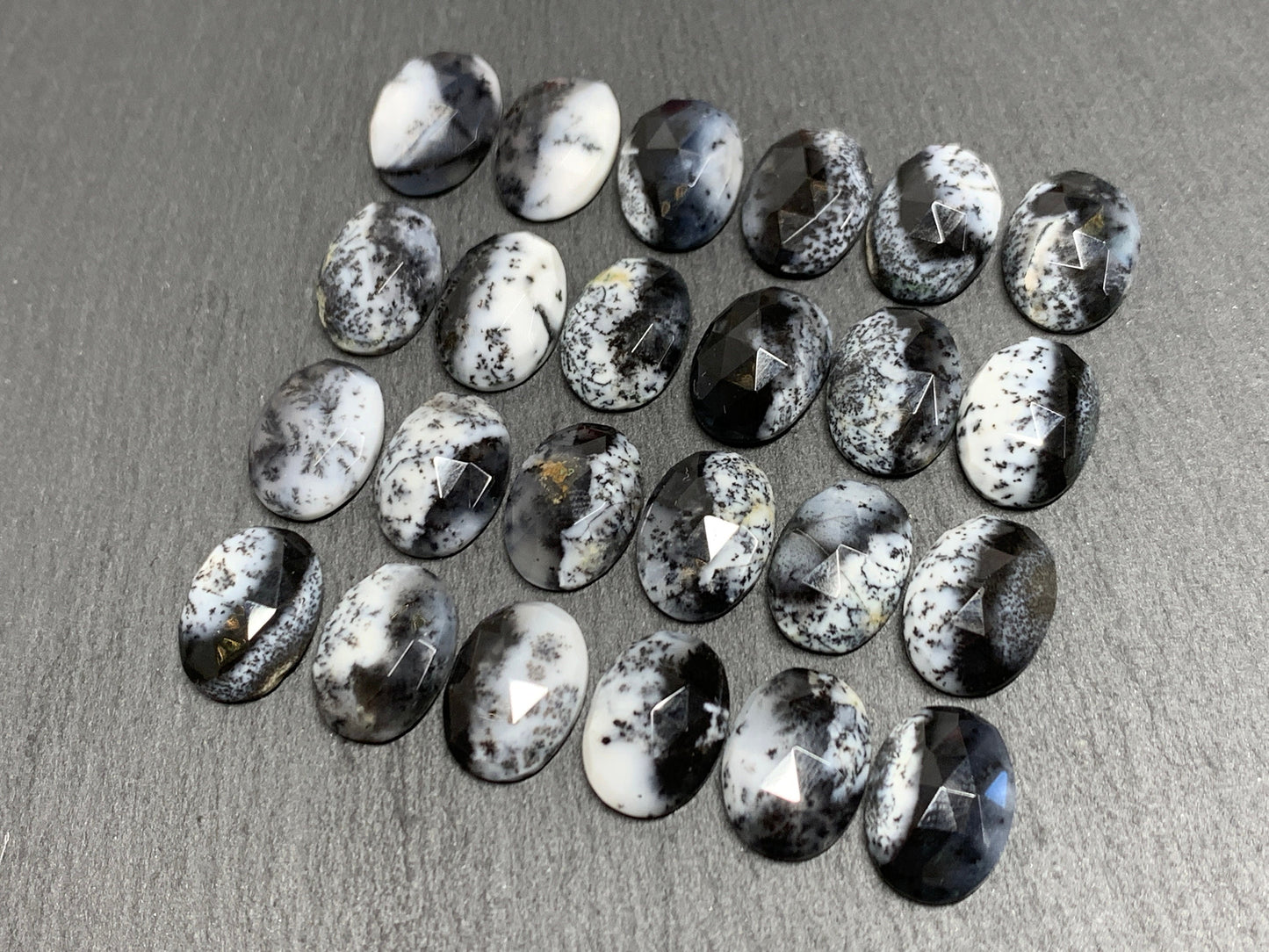 Faceted Dendrite Opal oval 10x14mm cabochon