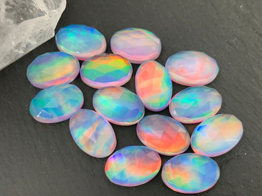 Faceted Aurora Opal oval 8x12mm cabochon - Doublet cabochons