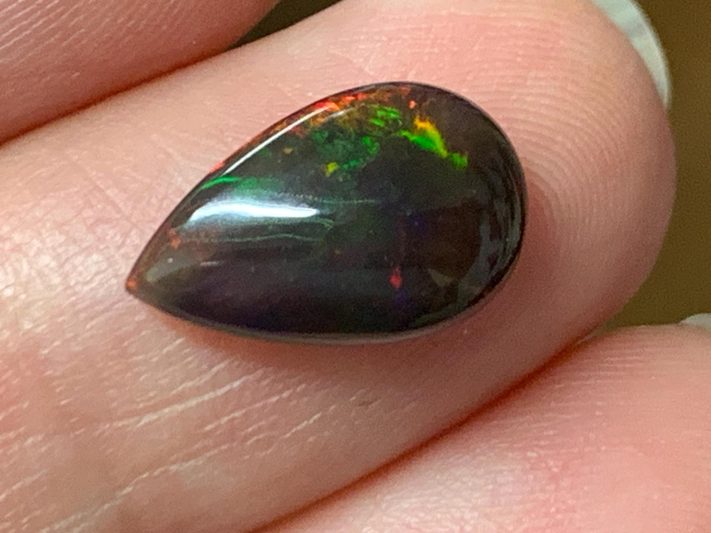 Natural Ethiopian Black Opal 8x13x4mm cabochon