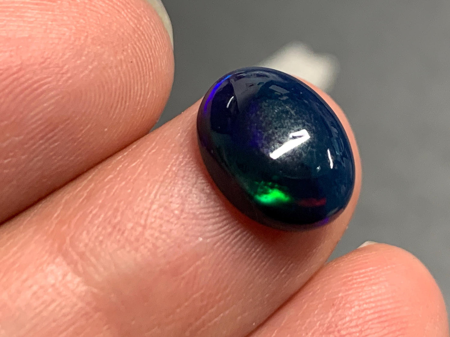 Natural Black Ethiopian Opal oval 9x11x4mm cabochon