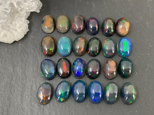 Black Ethiopian Opal oval 4x6mm cabochon