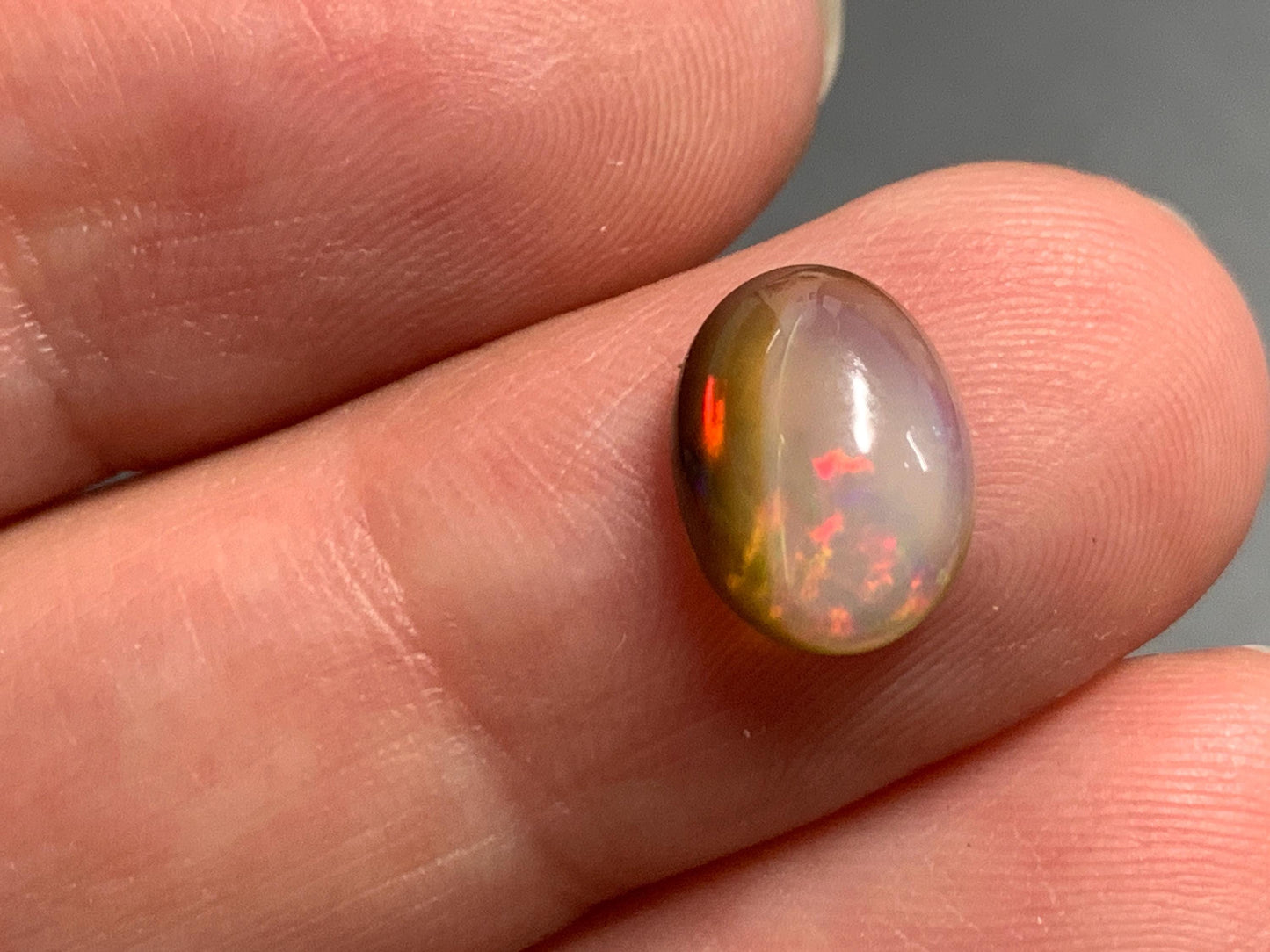 Natural Black Ethiopian Opal oval 7x10x4mm cabochon