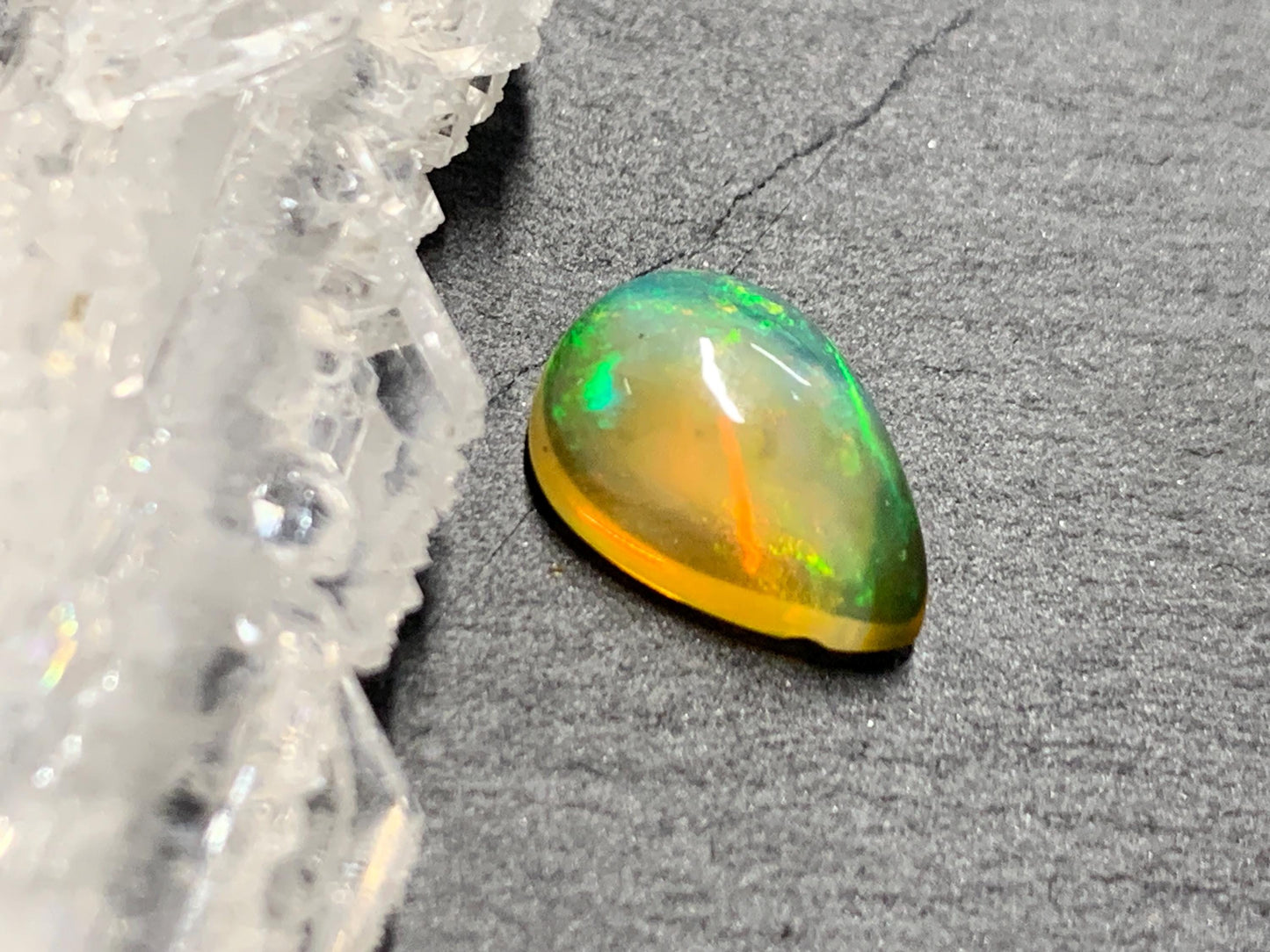 Natural Black Ethiopian Opal pear 8x11x5mm cabochon