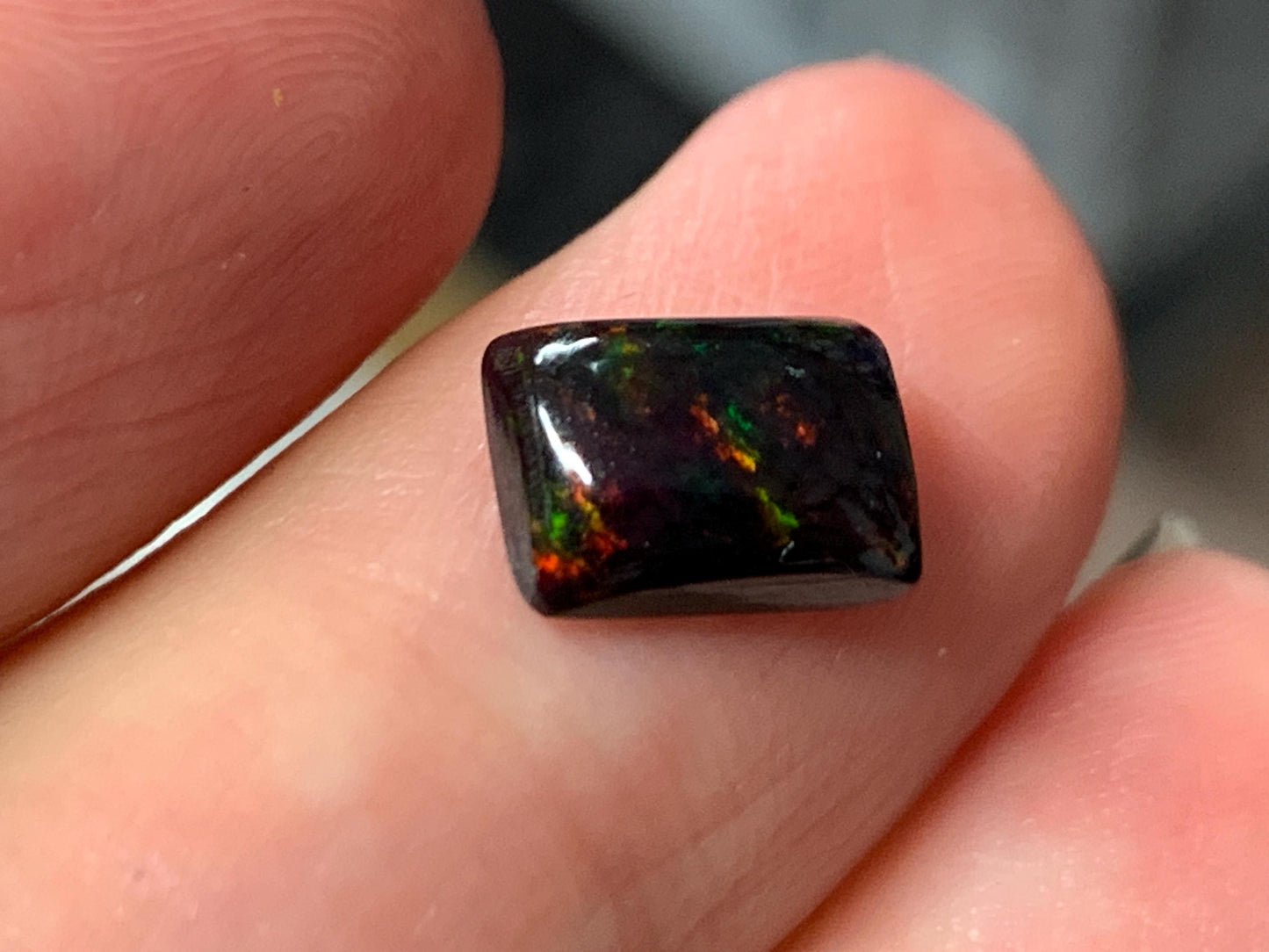 Natural Ethiopian Black Opal 6x8x3mm cabochon
