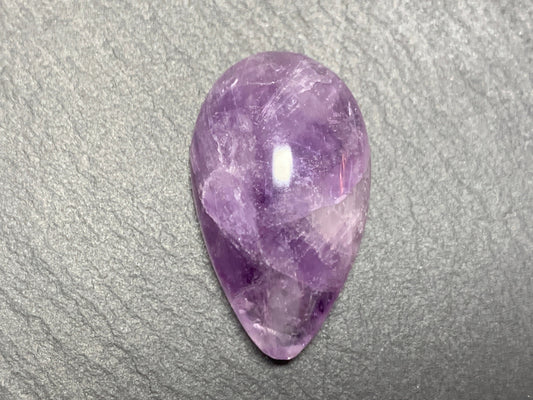 Amethyst pear 32x19x11mm cabochon- free form hand cut in Africa