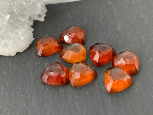 Faceted Hessonite Garnet trillion 6mm cabochon