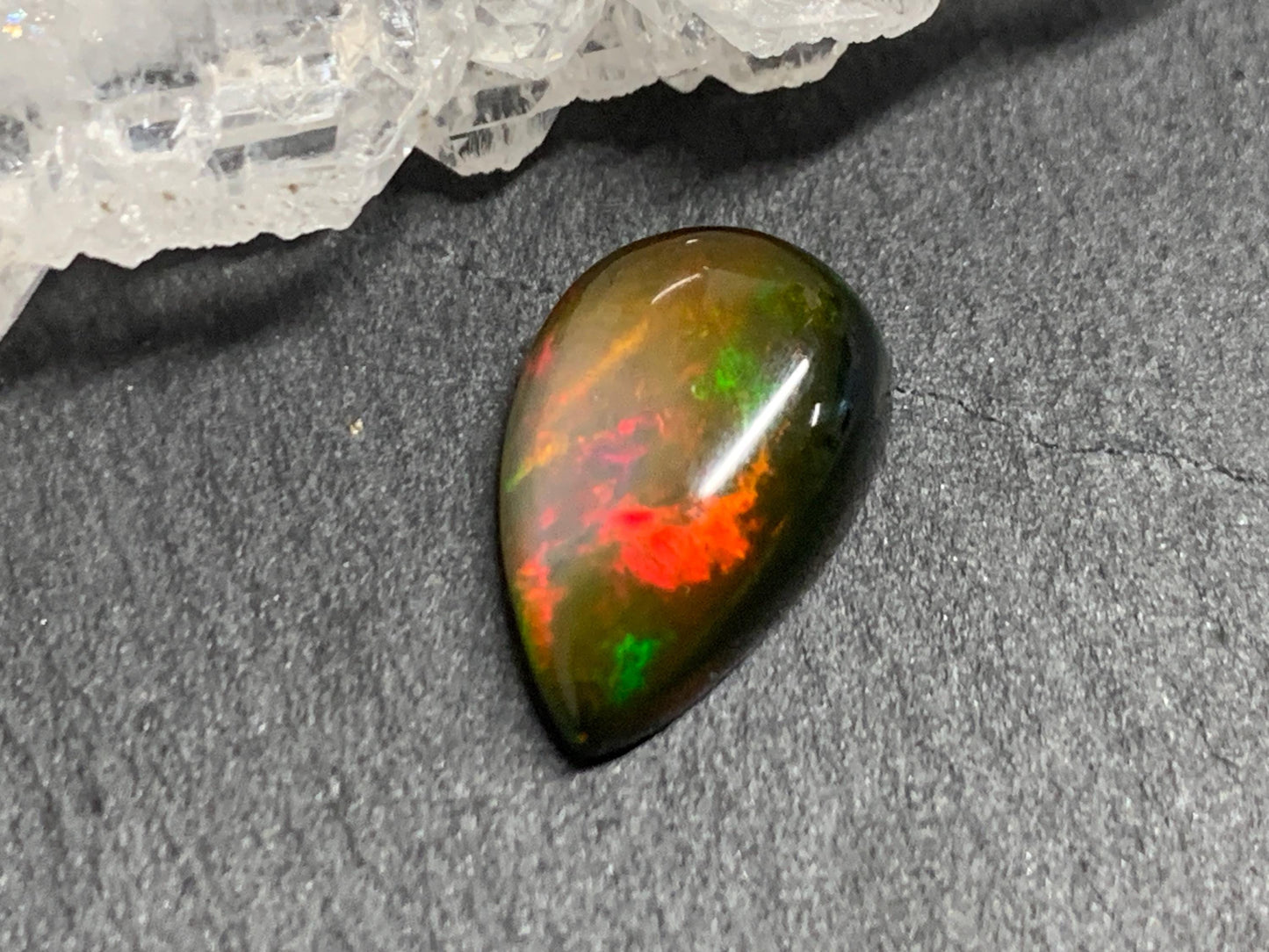 Natural Black Ethiopian Opal pear 8x13x4mm cabochon