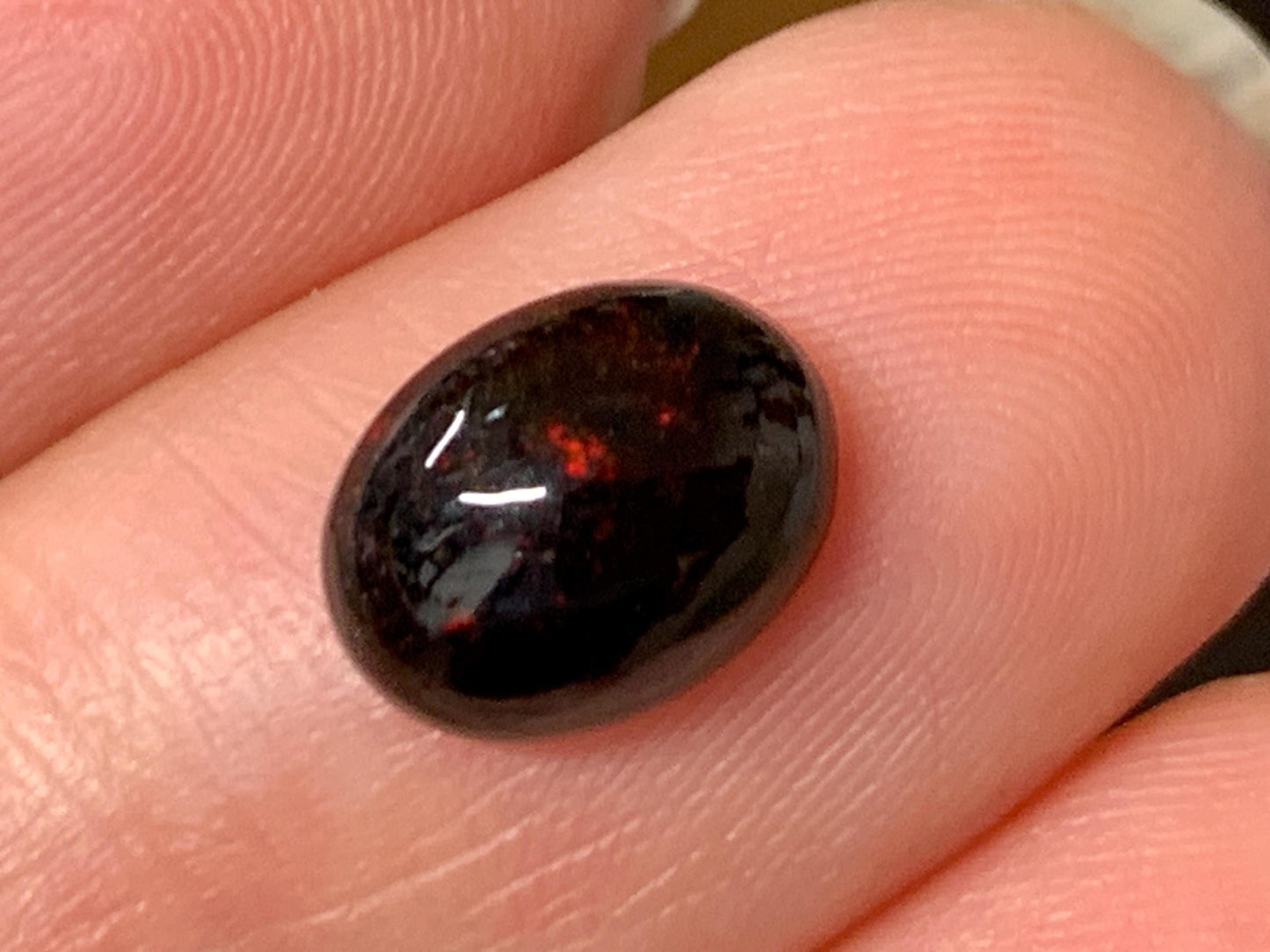 Natural Ethiopian Black Opal 7x9x4mm cabochon