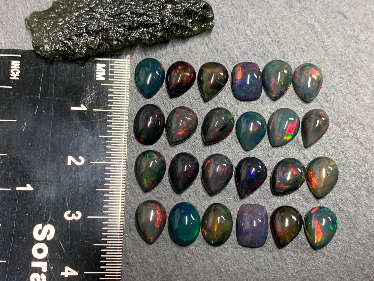 Black Ethiopian Opal pear, rectangle 6x8mm cabochon